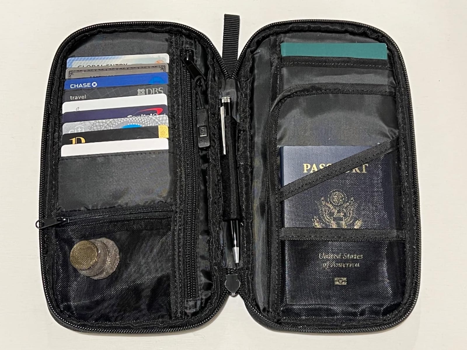 Amazon Basics RFID-blocking Passport Wallet, Passport Holder for Travel, Polyester/Nylon Material with Durable Zipper Closure, Zippered Pockets, Slots for Cards, 10