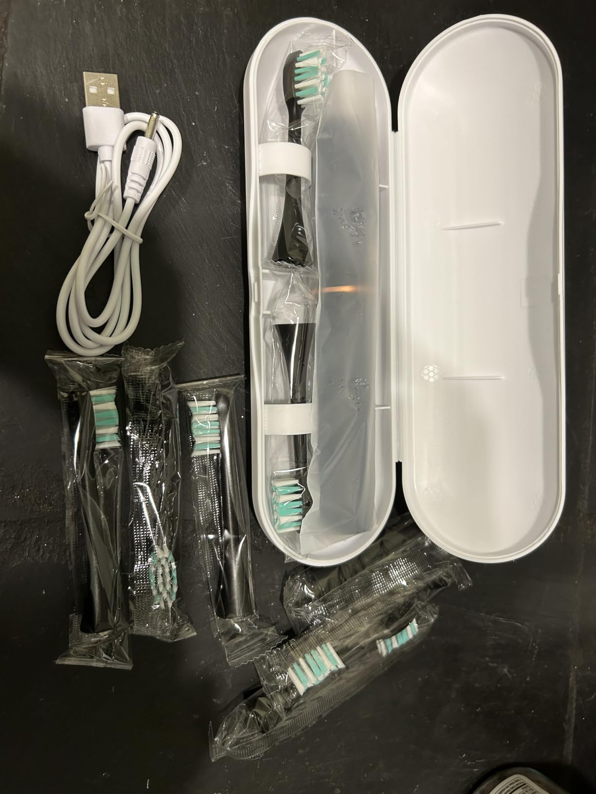 kingheroes Electric Toothbrush Set, Comes with 8 Brush Heads & Travel Case,4 Modes with 2 Minutes Built in Smart Timer, One Charge for 60 Days, 42000 VPM Motor (Black) customer photo 2