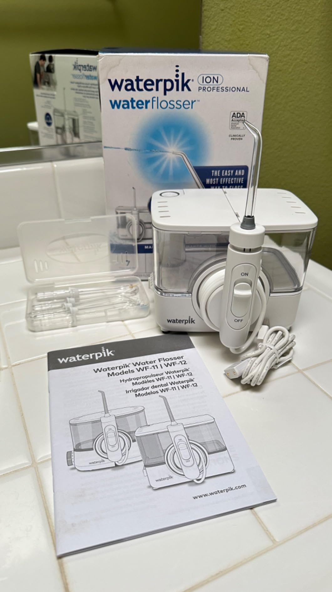 Waterpik ION Rechargeable Water Flosser with 10 Settings, 7 Tips, White customer photo 1