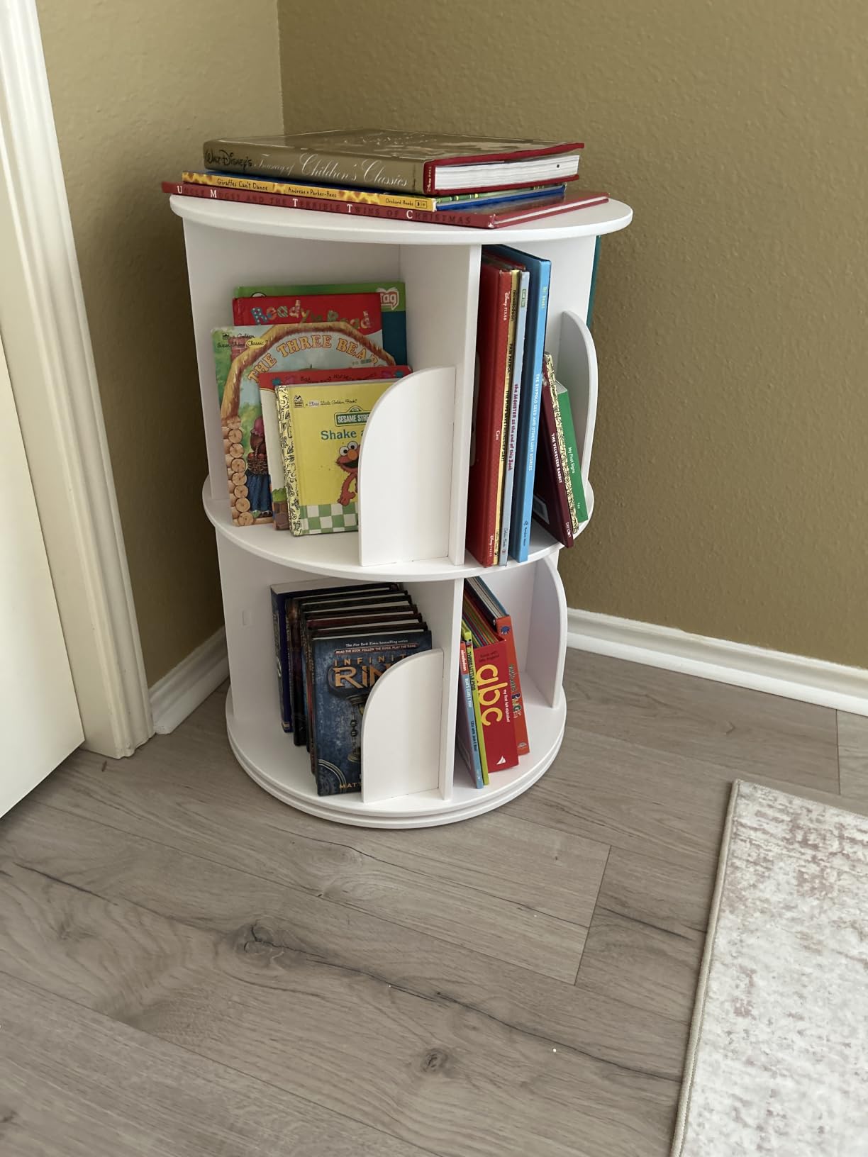 SpaceAid 4 Tier Rotating Bookshelf Tower, Spinning Bookcase Lazy Susan, Revolving 360 Book Shelf Storage Round Carousel, Vertical Rotate Turning Spiral Corner Organizer, White customer photo 1