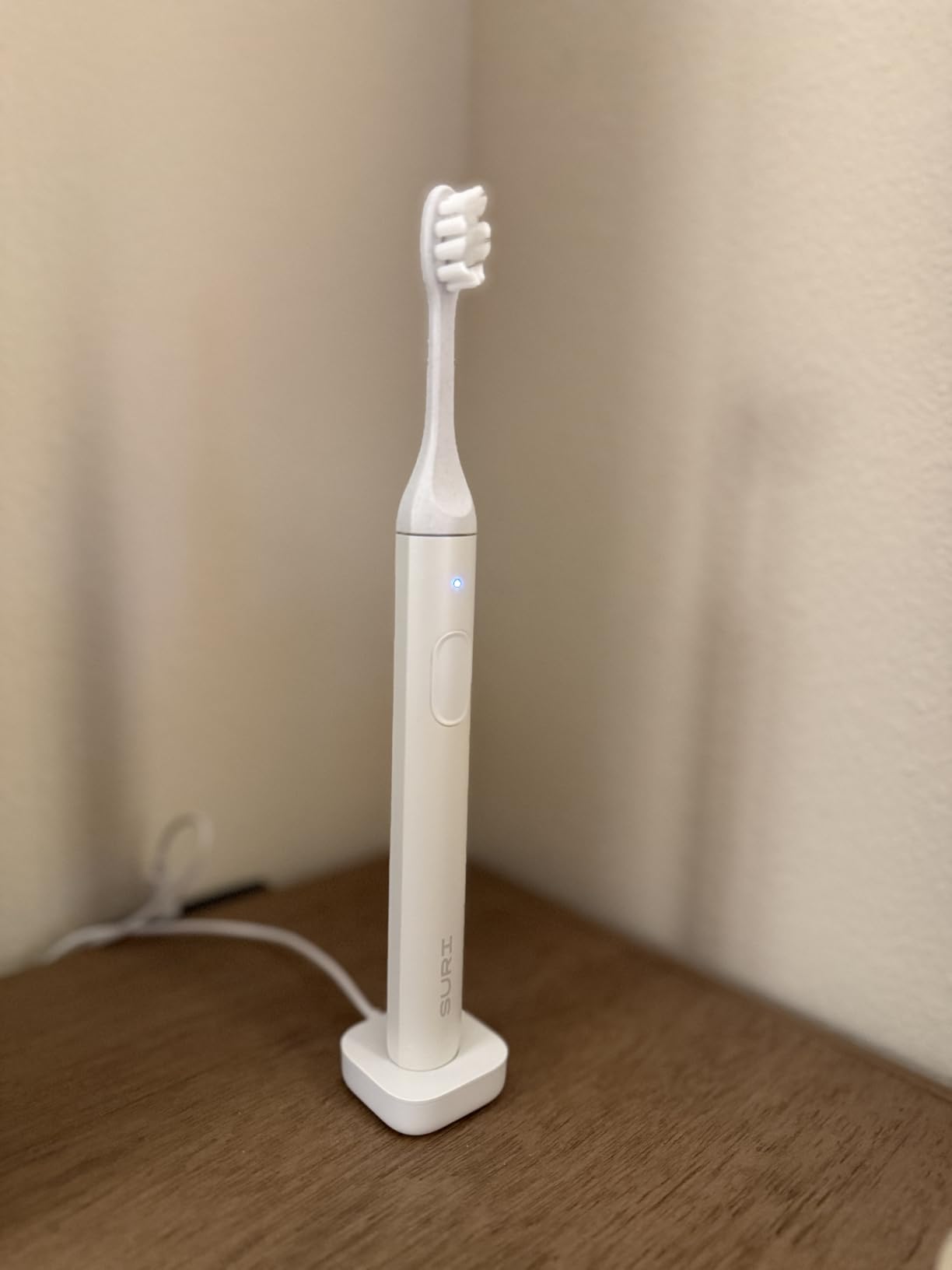 SURI Pro Sonic Electric Toothbrush | Over 4+ Weeks Battery | UV Cleaning Travel Case | Pressure Sensor | Aluminium Body | 2-Minute Timer | Plant-Based Head | Green customer photo 2